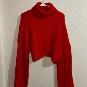 orange turtle neck sweater